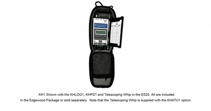Elecraft KH1 handheld transceiver shown in the ES20 padded black carrying case with log tray, keyer paddle, and whip antenna.