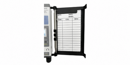 Open black logbook tray on KH1 transceiver, with lined log sheet and pen secured in side clip.